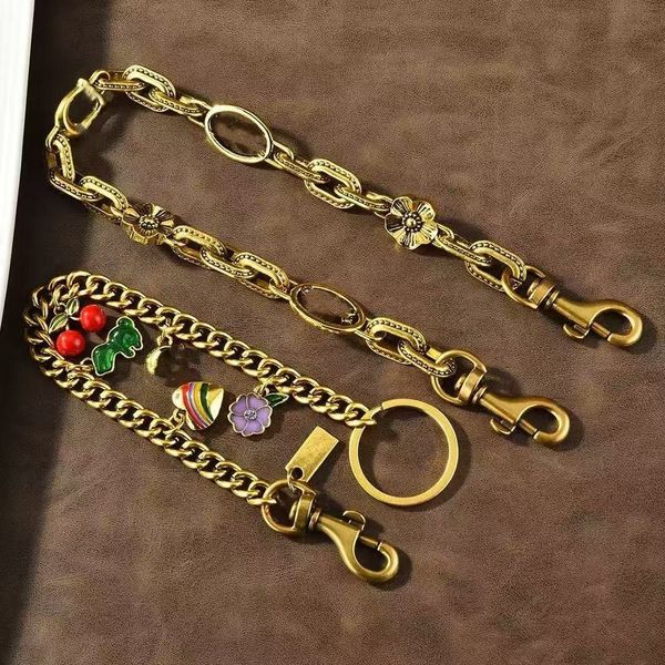 Fashion Dinosaur Cherry Charm Accessories Designer Womens Bag or Keychain Pendant co ch Cherry Decoration Personalized Womens Wallet chain Bracelet dhgate AAA